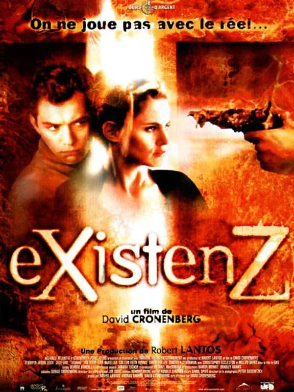 Affiche de « eXistenZ » avec deux personnes et un pistolet organique, slogan « On ne joue pas avec le réel…