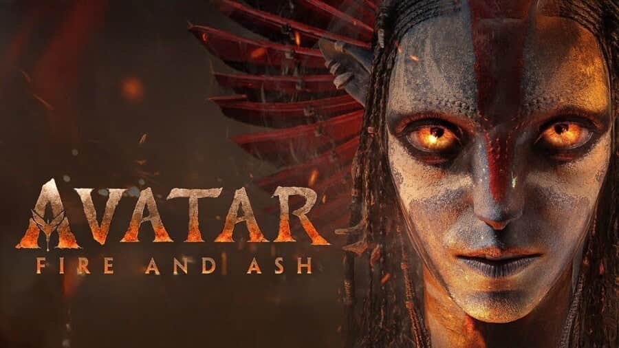 Affiche de « AVATAR FIRE AND ASH » avec le visage peint d’un personnage aux yeux orange lumineux.