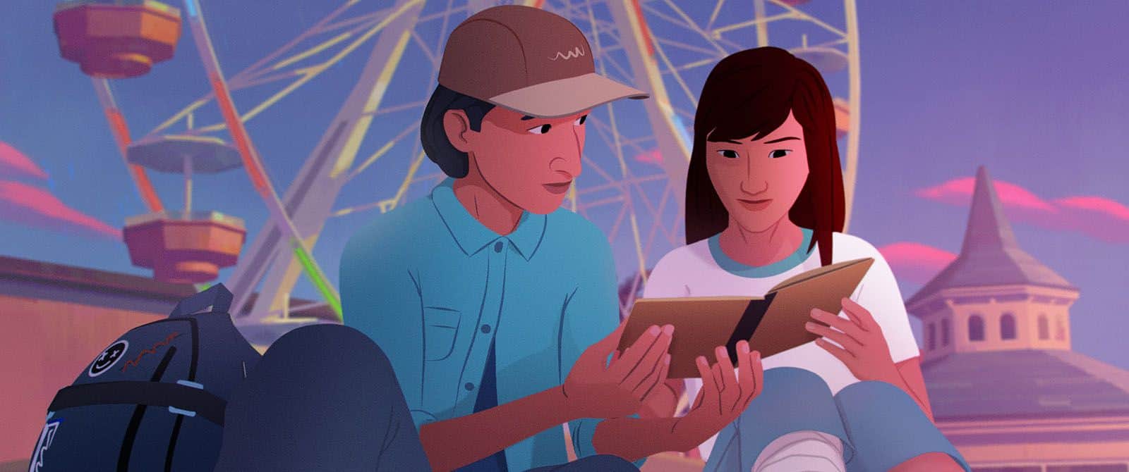 Deux jeunes consultent un livre devant une grande roue, avec un château en arrière-plan.