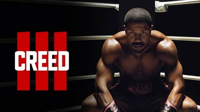 Affiche de « CREED III » avec un boxeur musclé accroupi dans un ring.