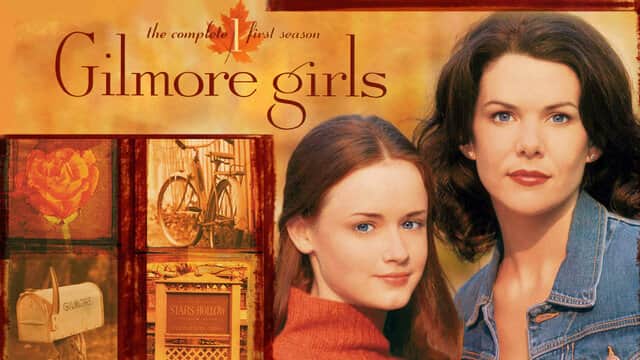 Affiche de « Gilmore girls » avec deux femmes, l'une aux cheveux bruns et l'autre aux cheveux roux, sur fond automnal.