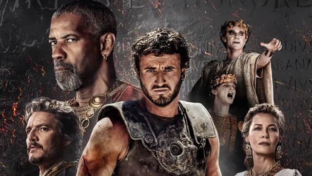 Affiche de « GLADIATOR 2 » avec plusieurs personnages en tenue romaine sur fond de mur gravé.