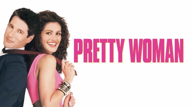 Affiche de « PRETTY WOMAN » avec un homme en costume et une femme souriante en robe rose.