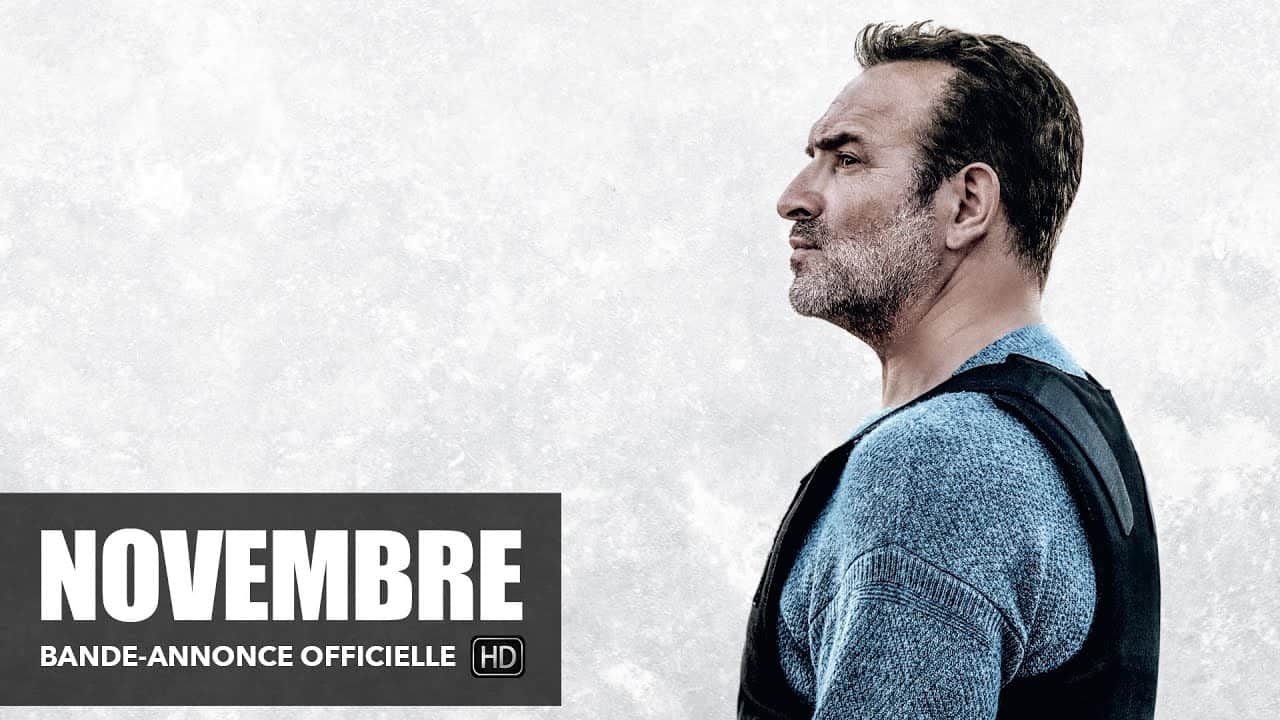 Affiche de « NOVEMBRE » avec un homme en profil portant un gilet pare-balles.