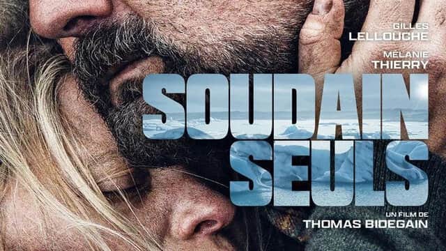 Affiche de « SOUDAIN SEULS » avec un homme barbu tenant une femme endormie.